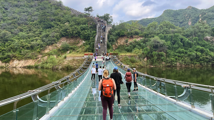 Walking over the Glass Bridge at the Lakeside Great Wall